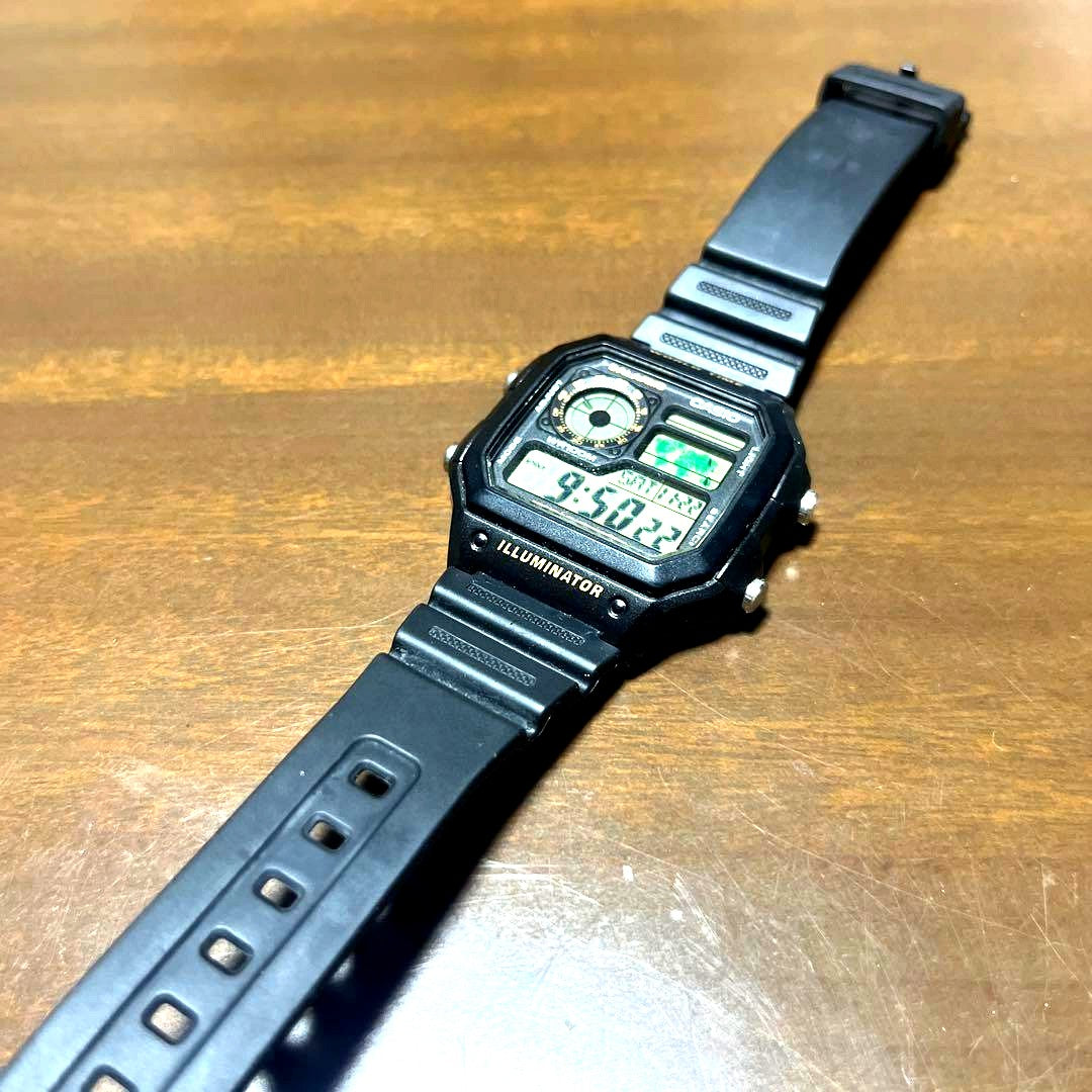 Casio Illuminator digital watch with black rubber band and digital display