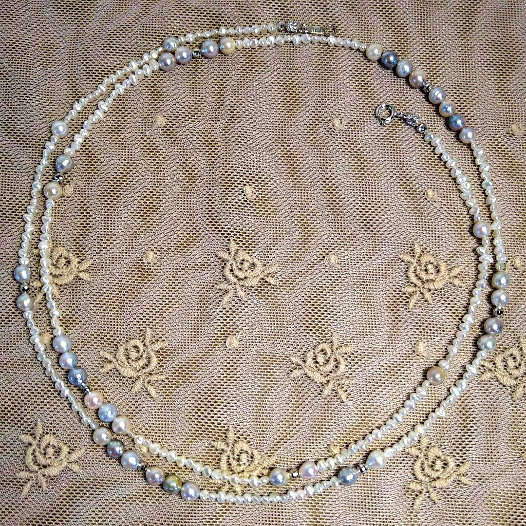 Long necklace with 2.5-3.5mm Akoya Keshi pearls and 5mm natural color Akoya baroque pearls on silver925 chain