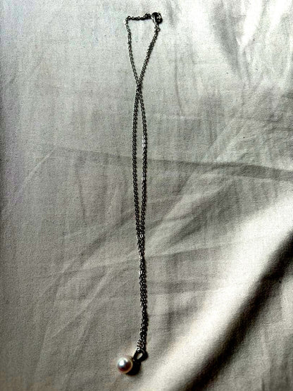TASAKI Akoya genuine pearl necklace with 7.4mm pearls and 40cm length chain displayed on white background