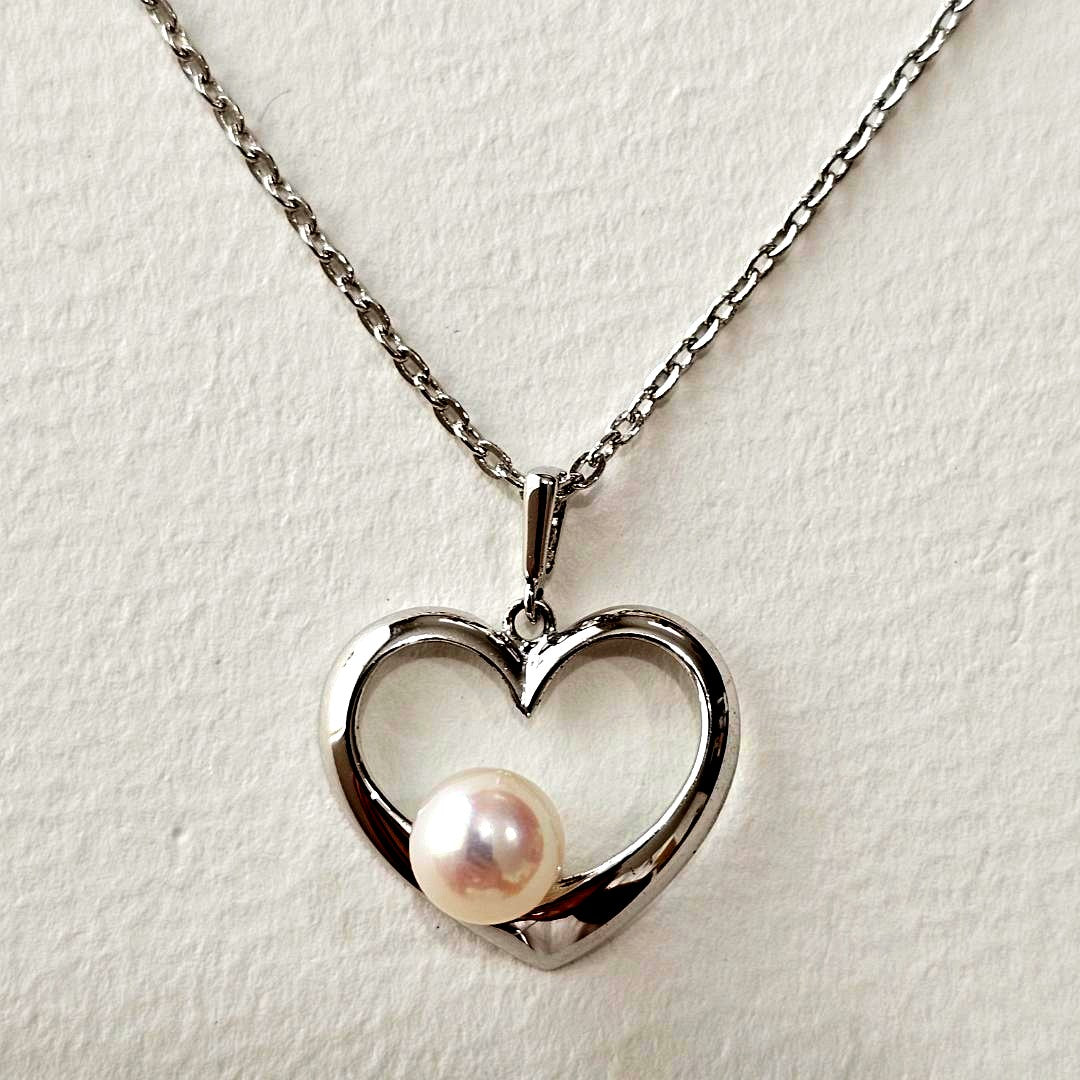 Mikimoto sterling silver necklace with 6mm pearl and heart-shaped pendant on 40cm chain