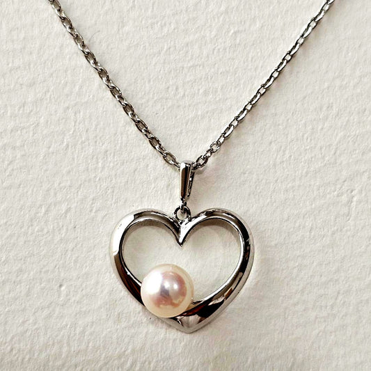 Mikimoto sterling silver necklace with 6mm pearl and heart-shaped pendant on 40cm chain