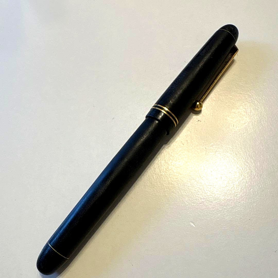 PILOT 14K-585 F vintage fountain pen with gold nib showing retro design and signs of aging