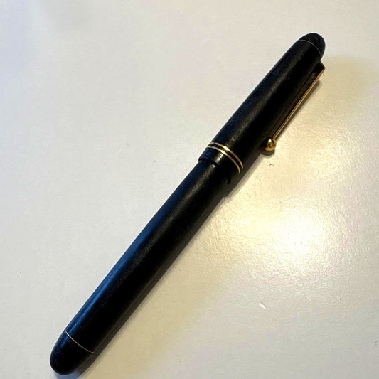 PILOT 14K-585 F vintage fountain pen with gold nib showing retro design and signs of aging