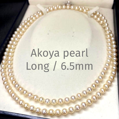 LongAkoya 96cm 2 strand necklace featuring 6.5mm round white Akoya pearls with silver marking