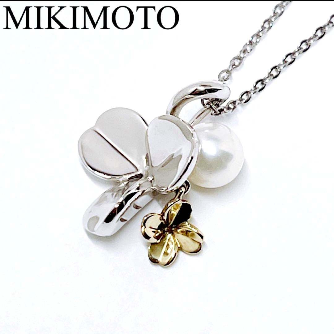 Mikimoto silver necklace with a 6.9mm pearl and four-leaf clover pendant on a 44.5cm chain
