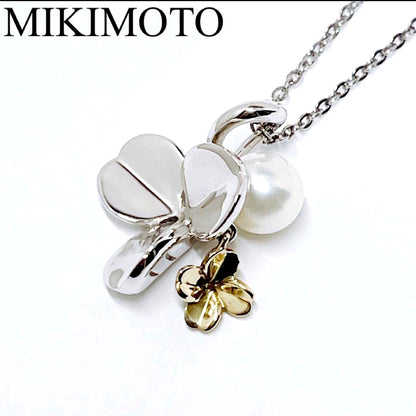 Mikimoto silver necklace with a 6.9mm pearl and four-leaf clover pendant on a 44.5cm chain