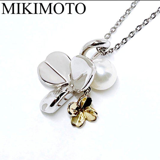 Mikimoto silver necklace with a 6.9mm pearl and four-leaf clover pendant on a 44.5cm chain