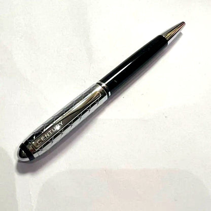 Century Cross Aurora silver black ballpoint pen with diamond cut design showing minor wear