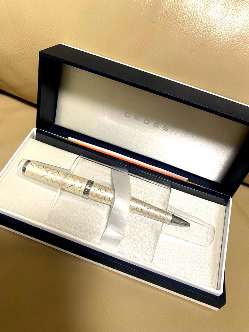 Cross white metal ballpoint pen with round pattern design and gift box with ribbon