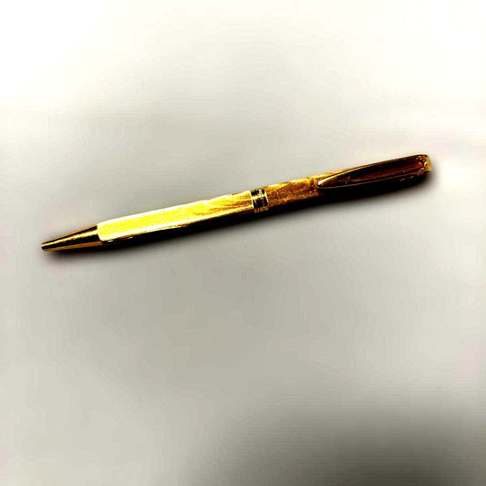 Waterman gold color ballpoint pen with sleek design and smooth finish