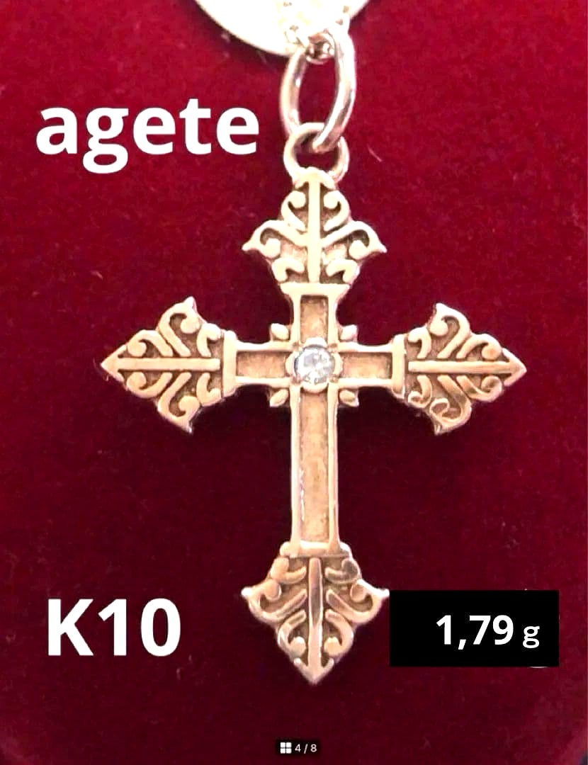 Agatte K10 gold pendant top with antique leaf motif cross and center diamond weighing 1.79 grams