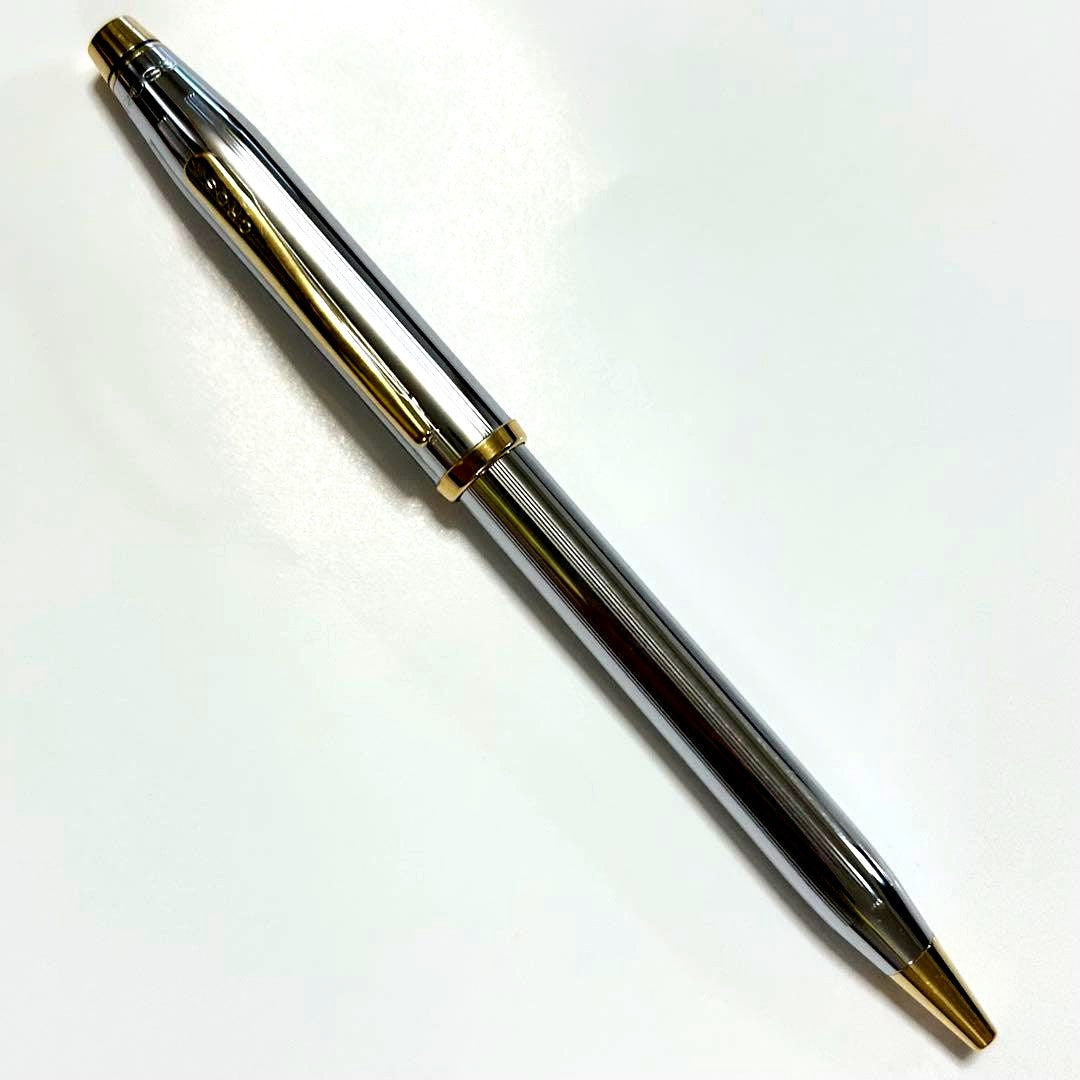 Cross Century II Medallist ballpoint pen in gold and silver with original case on white background