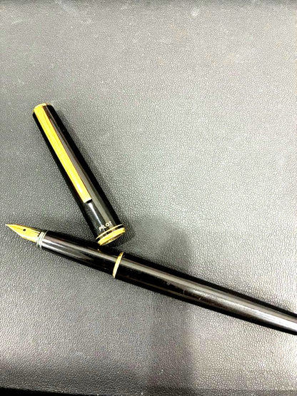 PILOT Fountain Pen in black color with extra fine nib positioned on white background