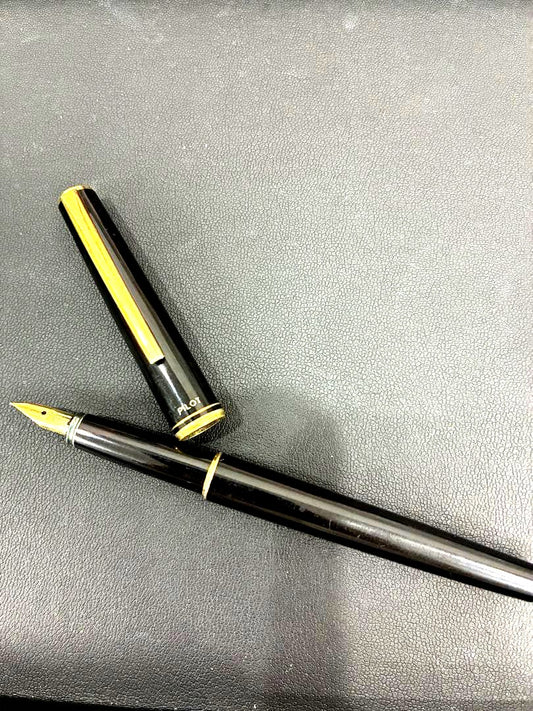PILOT Fountain Pen in black color with extra fine nib positioned on white background