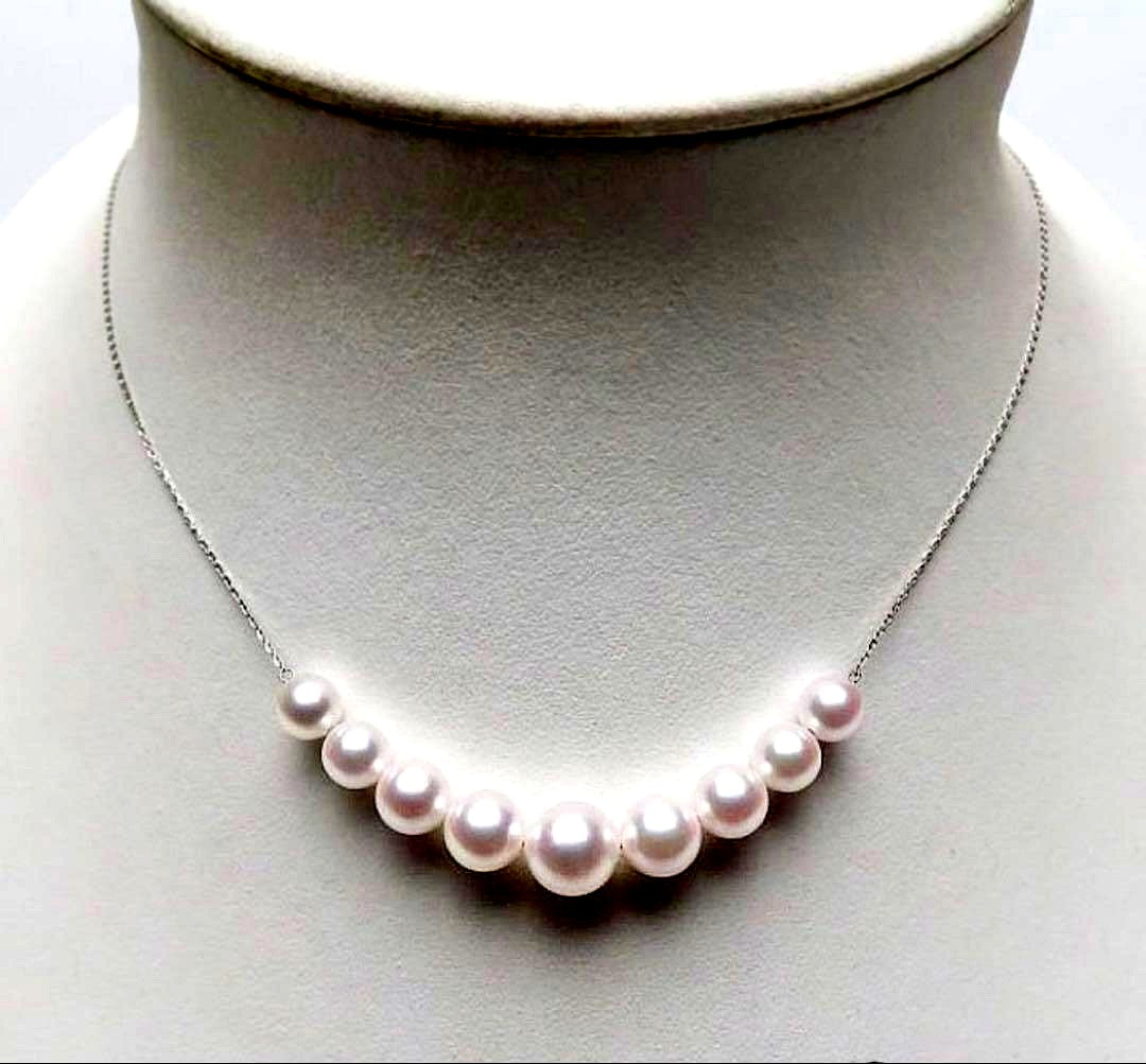White pink round Akoya pearl necklace with 9 pearls sized 7.8 to 5.6 mm on a 46 cm Pt850 chain