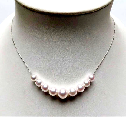 White pink round Akoya pearl necklace with 9 pearls sized 7.8 to 5.6 mm on a 46 cm Pt850 chain