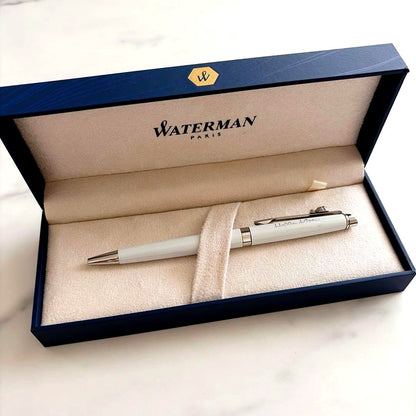Waterman and Hello Kitty ballpoint pen with metal body and colorful design on white background