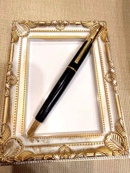 Pilot Click fountain pen with 14K gold nib, black resin body, and gold fittings