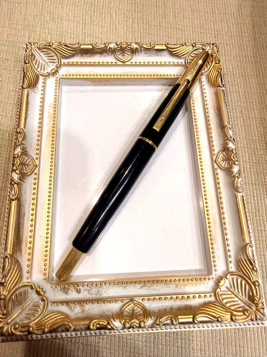 Pilot Click fountain pen with 14K gold nib, black resin body, and gold fittings