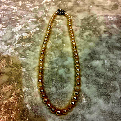 Akoya pearl necklace with white 6mm pearls and silver flower-shaped clasp, 40.5cm length