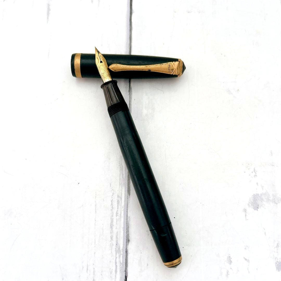 PILOT 14K gold fountain pen model 8063 made in Japan shown with cap on