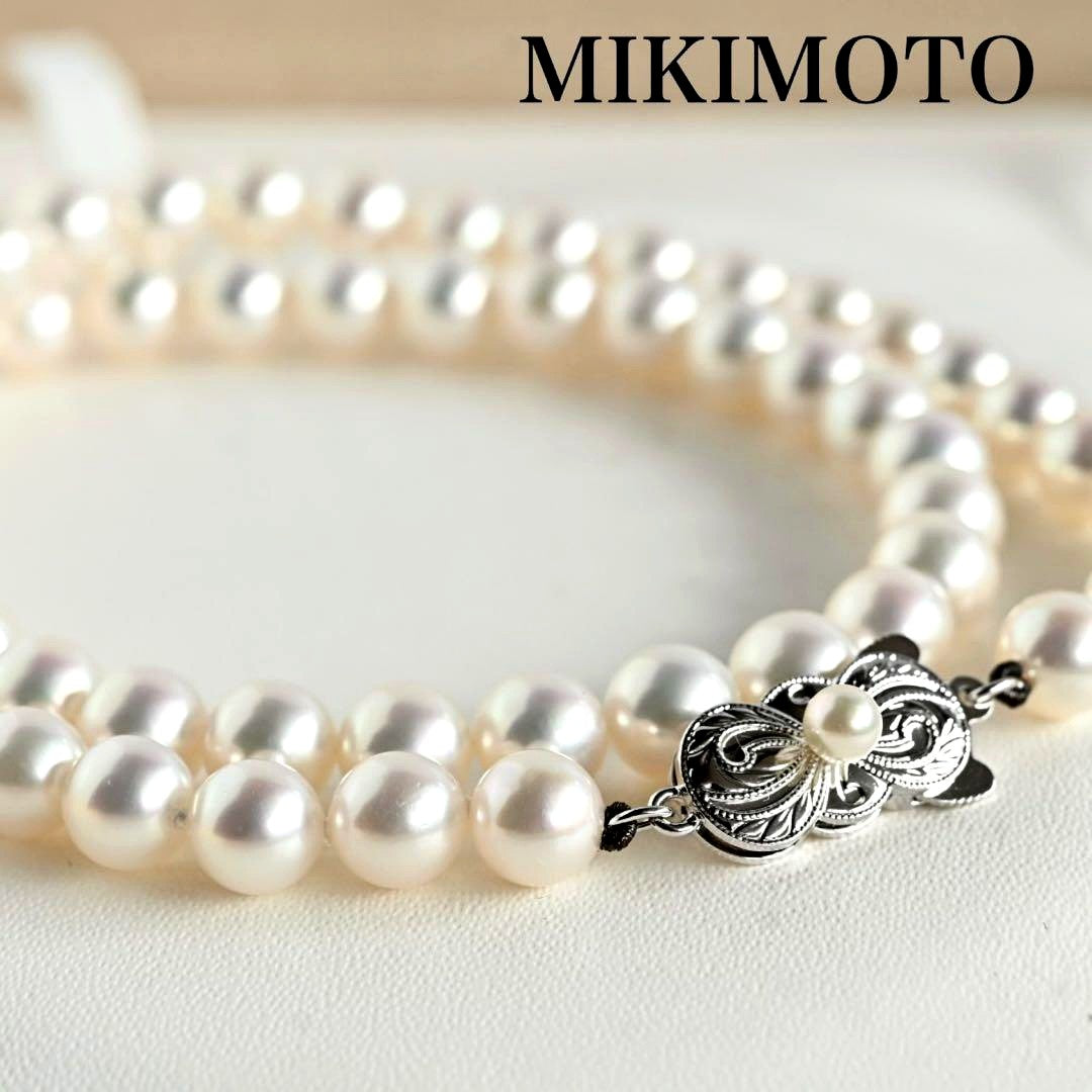 Mikimoto Akoya pearl necklace with round 7mm pearls and silver Aurora Hanadama pearl clasp