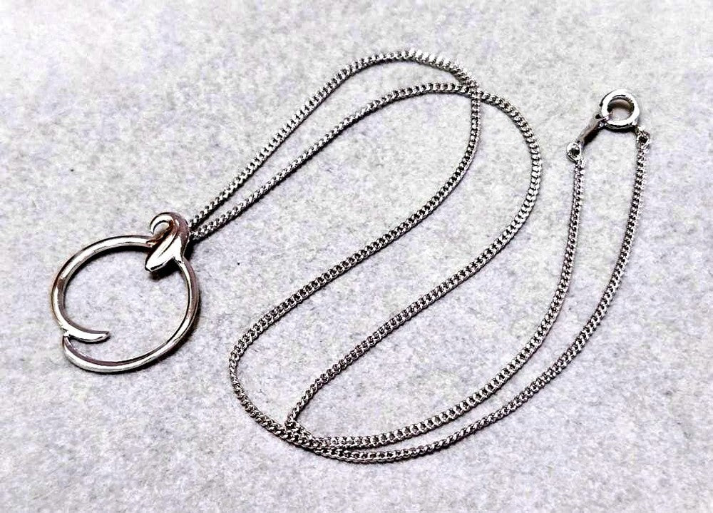 Mikimoto Circle Silver Necklace with a circle pendant on a 43 cm silver chain