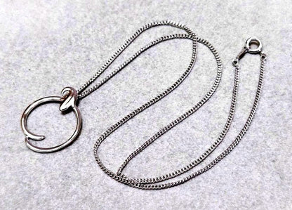 Mikimoto Circle Silver Necklace with a circle pendant on a 43 cm silver chain