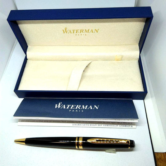 Waterman Expert Black GTBP ballpoint pen with metal black body and gold accents shown with dedicated case
