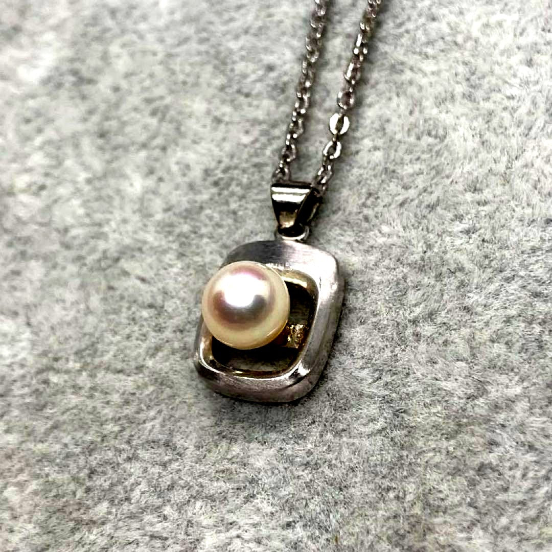 Akoya pearl necklace with 6.3mm white pearls and silver mark pendant on 41cm chain