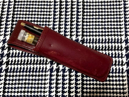 Cross mechanical pencil with wine-colored pen holder and 23 lead refills displayed
