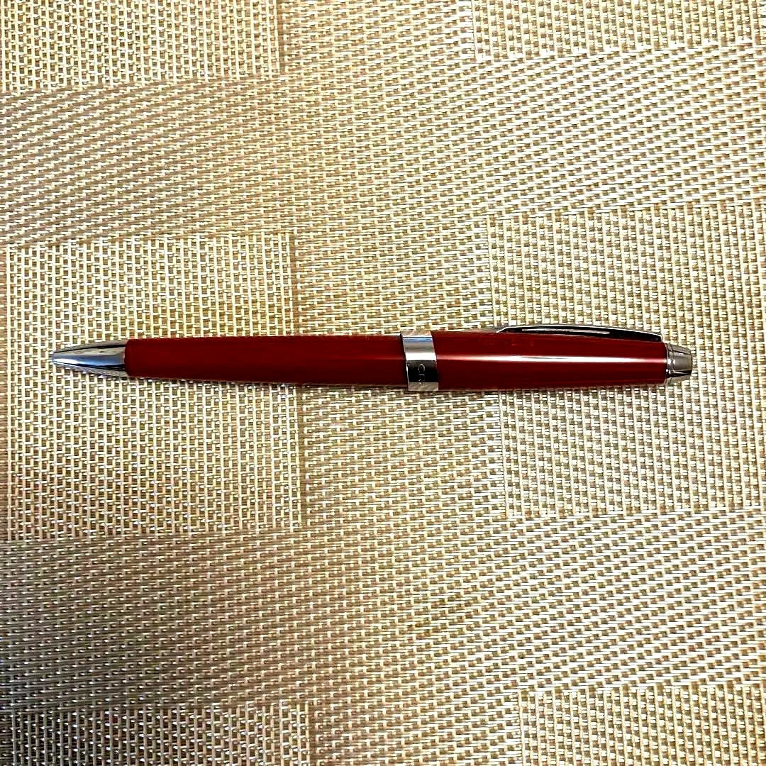 Cross ballpoint pen twist type in shiny Aventurared body, 57mm length, shown on white background