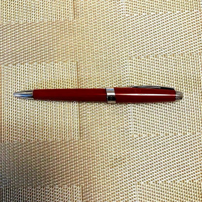 Cross ballpoint pen twist type in shiny Aventurared body, 57mm length, shown on white background