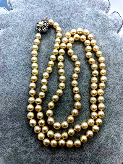 Long Akoya pearl necklace with 7mm genuine pearls on a silver chain measuring 80 cm