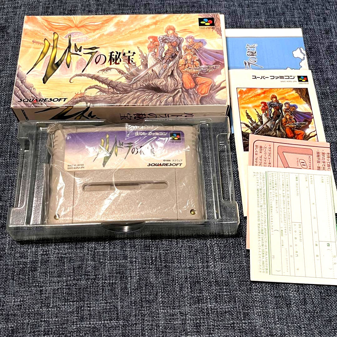 Ludra's Treasure Super Nintendo game complete with box, manual, postcard map, and cartridge