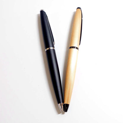 Two Cross ATX ballpoint pens model T1362 with visible wear and no ink