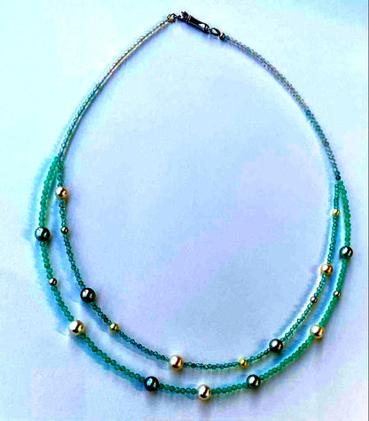 Akoya pearl layered necklace with 19 pearls in sea and sky colors showcasing transparency and unique design