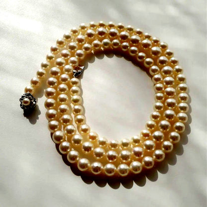 Akoya pearl necklace with genuine ivory pearls sized 8.6-7.0mm, 82cm long with clasp