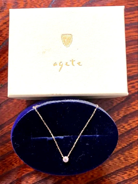 agete K18 gold necklace with 0.07 carat diamond and engraved design, elegant and certified