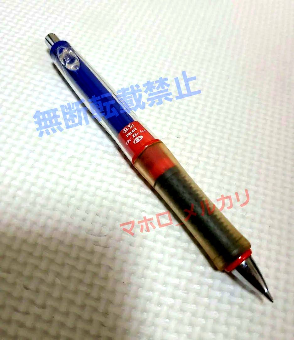 Used Pilot Ofloder Doctor Grip 0.5mm pen half red half blue with visible dirt and grip discoloration