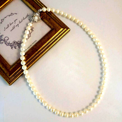 Akoya pearl necklace with 6.8mm pearls on a 40cm silver chain PN303