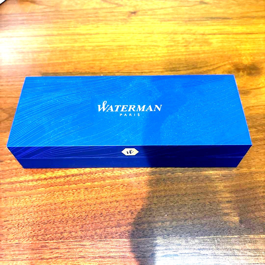 WATERMAN Paris ballpoint pen in sleek design with black and silver finish, shown uncapped