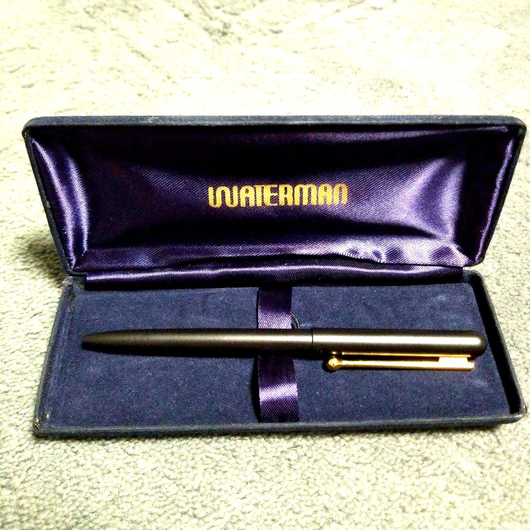 Waterman Ballpoint Pen approximately 13 cm long with black barrel and silver accents