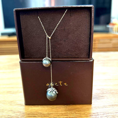 Agat Pearl Necklace made with South Sea pearls showing bubble inclusions, worn but in usable condition