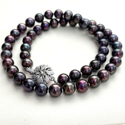 Akoya pearl necklace with 8-8.5mm peacock pearls and silver fittings measuring 45.5cm length