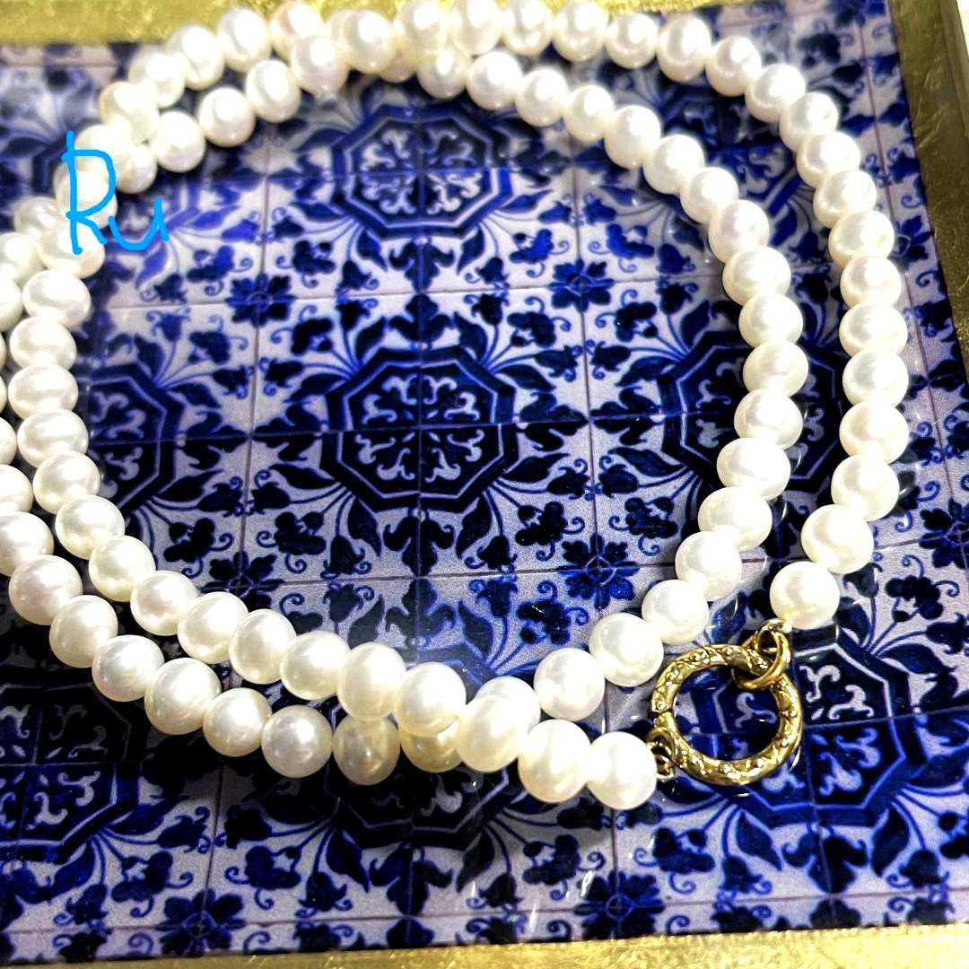 Agete Classic Pearl Clicker Necklace in gold-plated silver featuring pearl and spring sunlight design