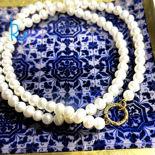 Agete Classic Pearl Clicker Necklace in gold-plated silver featuring pearl and spring sunlight design