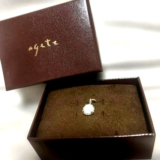 agete necklace charm with oval labrodite and malachite gemstones displayed with a dedicated box