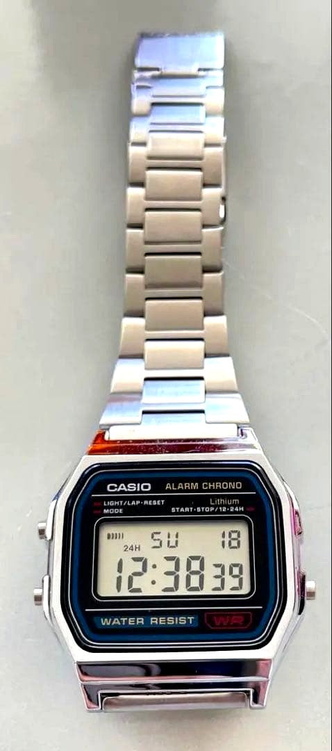 Casio A158WE digital watch showing time with stainless steel band and rectangular face