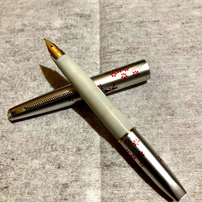 Showa Retro PILOT fountain pen with 14K nib, silver white barrel, red ornamented grip, and flower pattern design